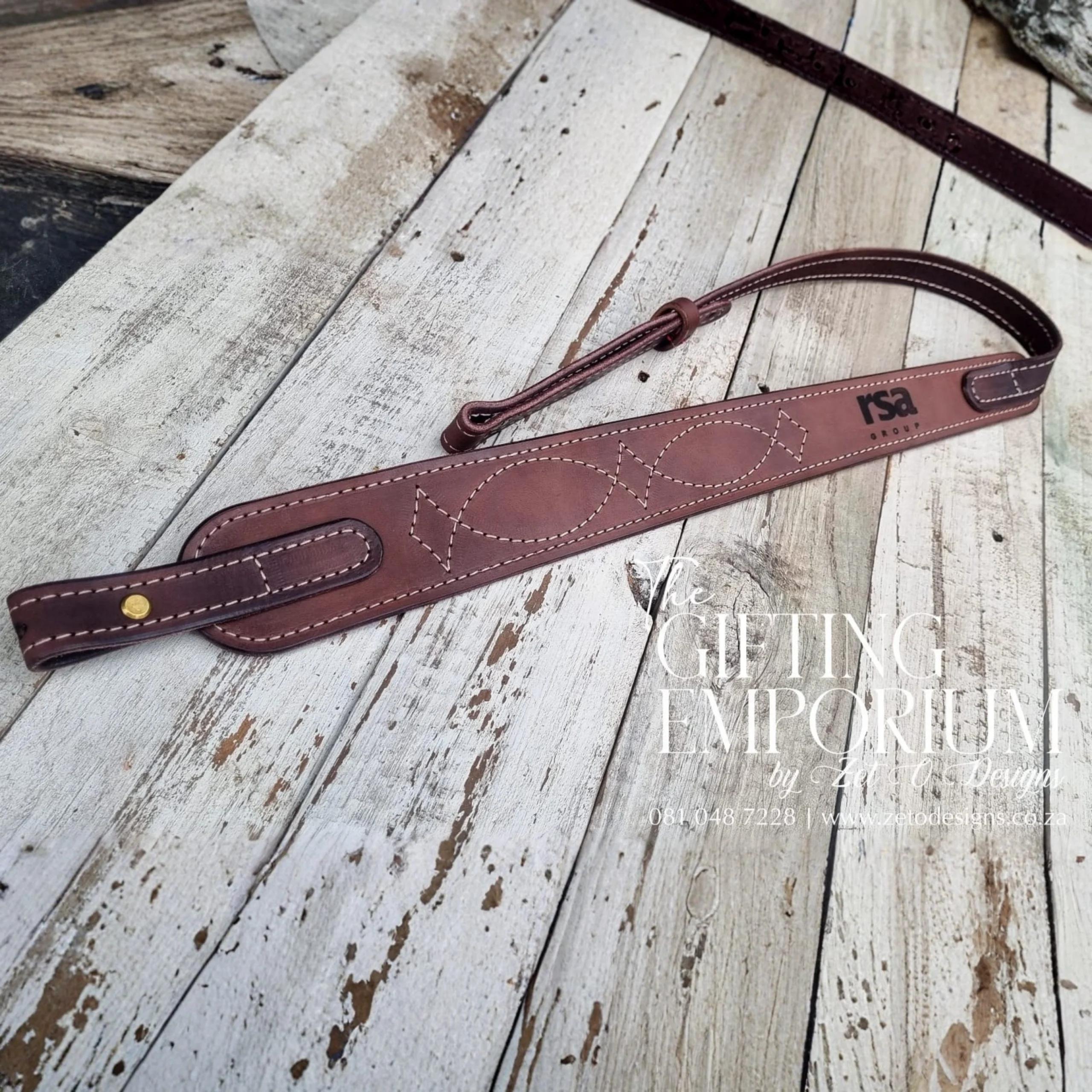 Premium leather rifle sling with padded shoulder support for comfortable all-day hunting