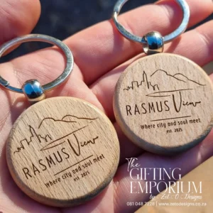 Custom engraved wooden keyring handcrafted from natural wood with a personalised name.