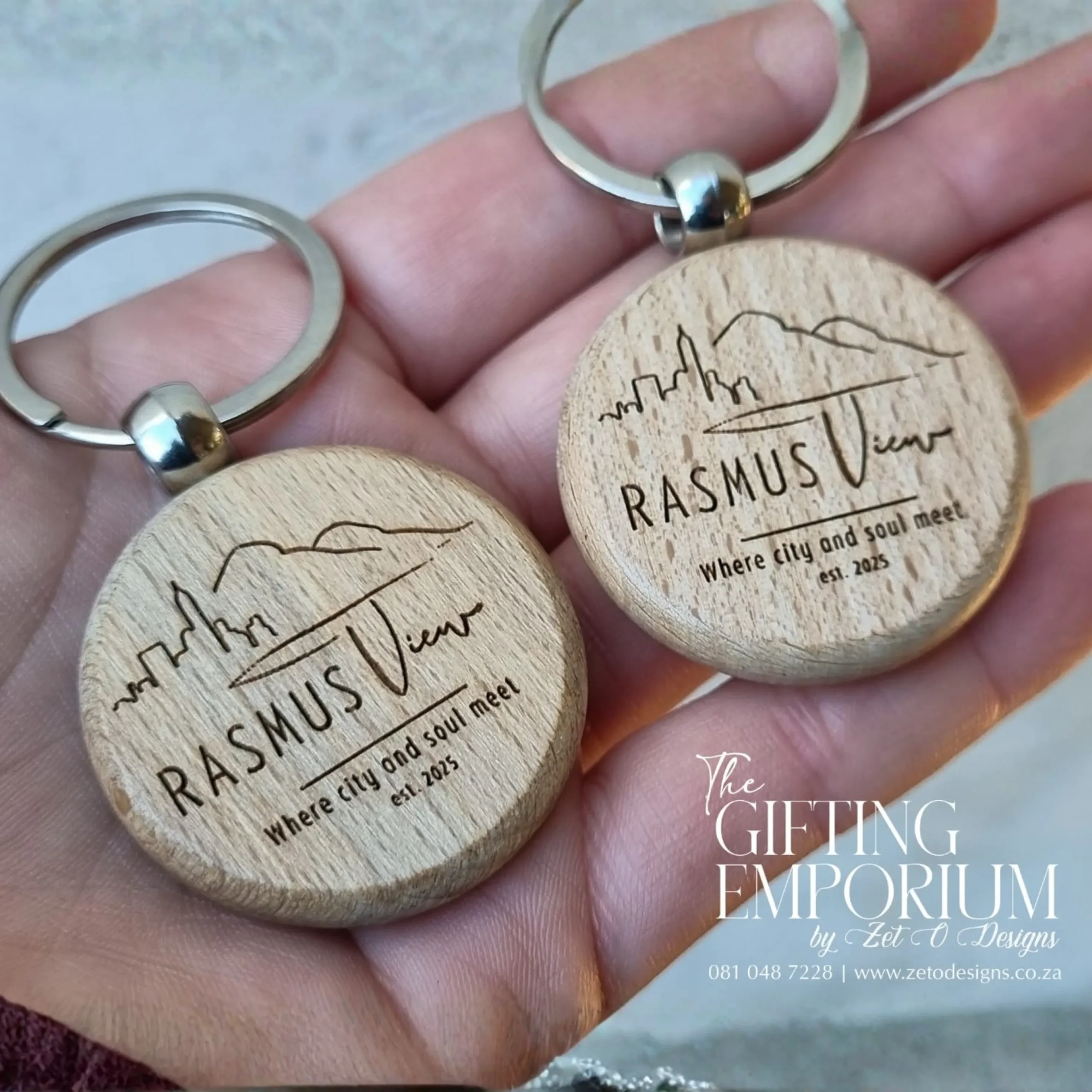 Personalised wooden keyring displayed as a wedding guest thank-you gift and table place setting.