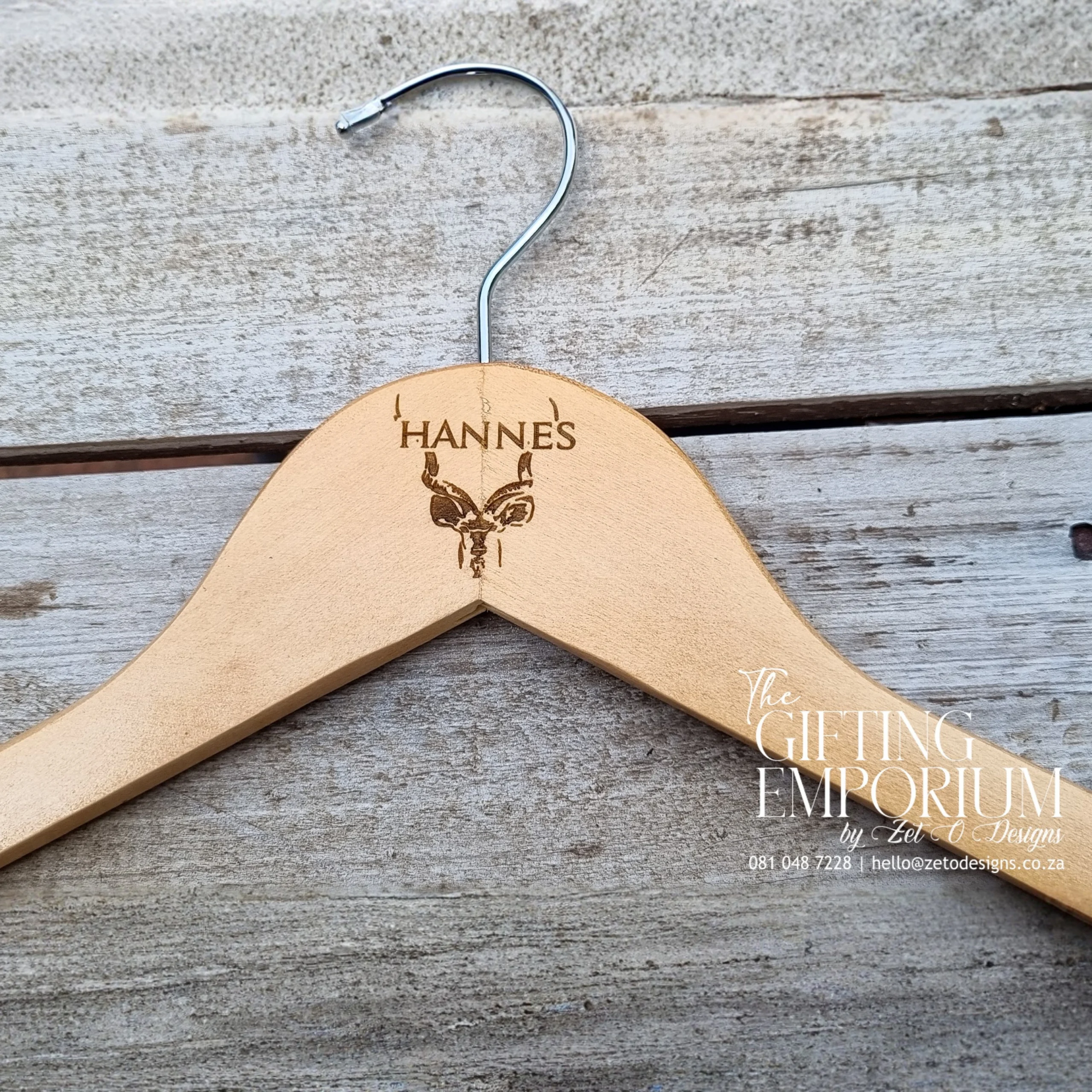 Custom engraved wooden wedding hanger for the groom.