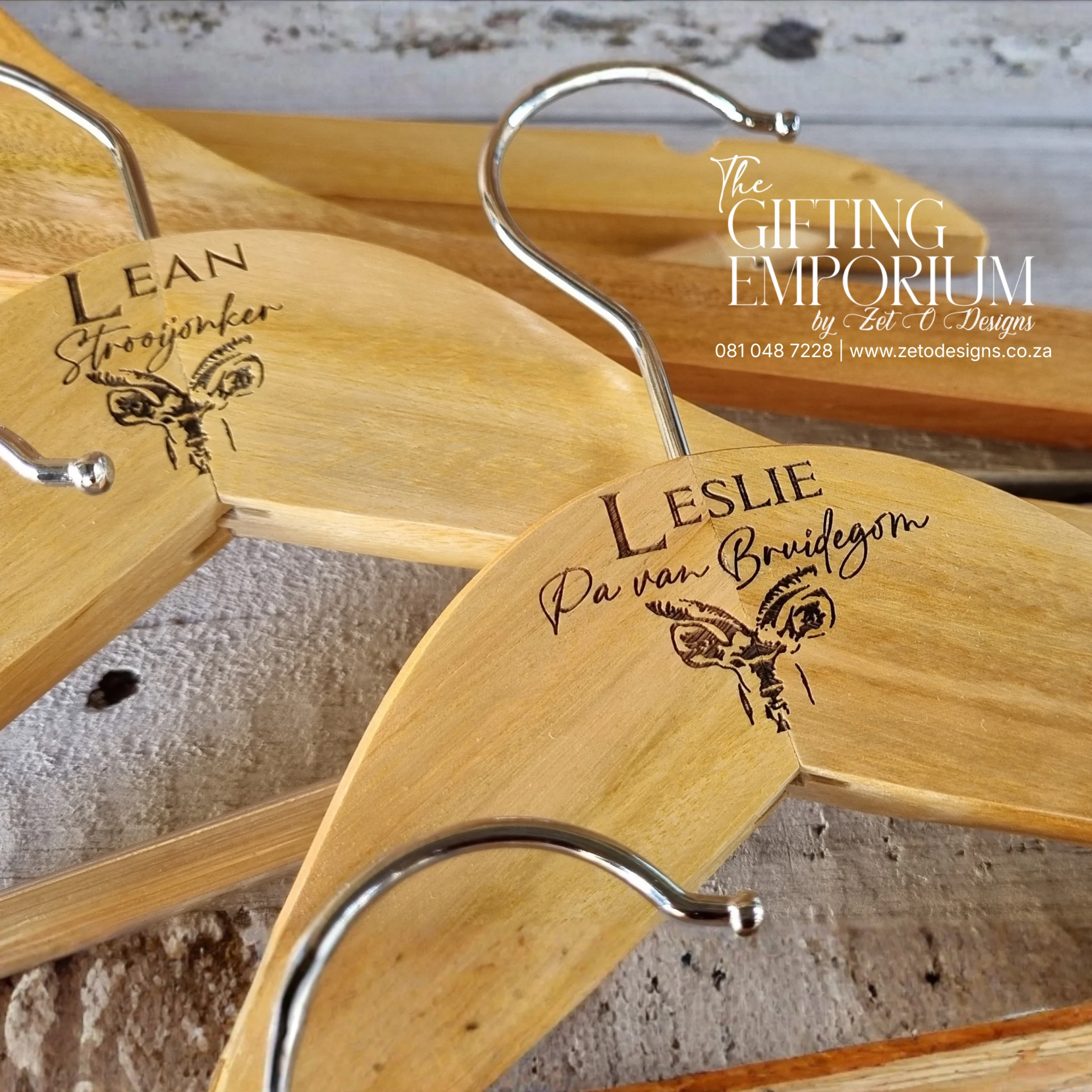 Rustic wooden hanger with elegant Kudu design.