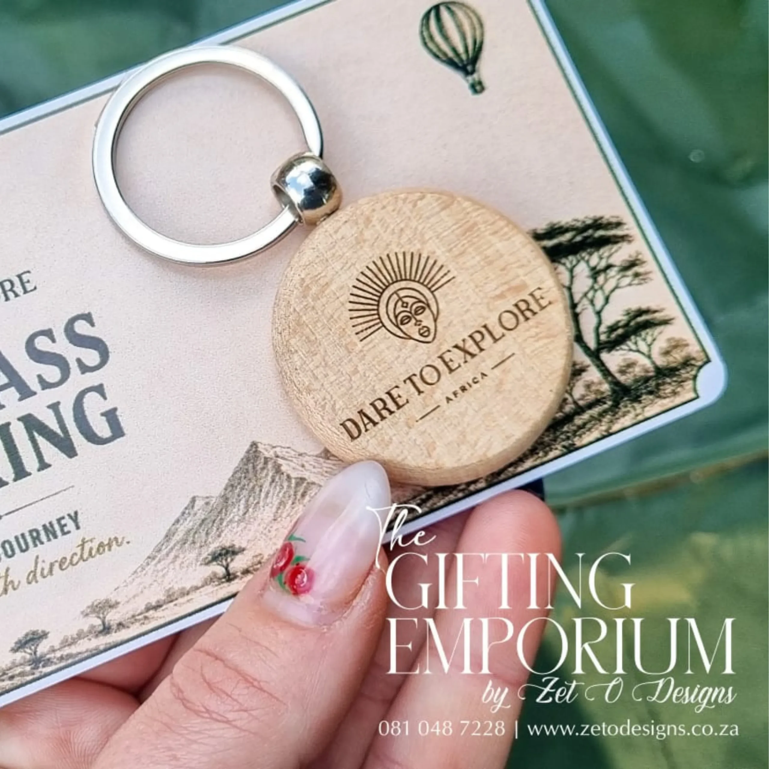 Personalised round wooden keyring laser engraved with a custom name and wildlife design.