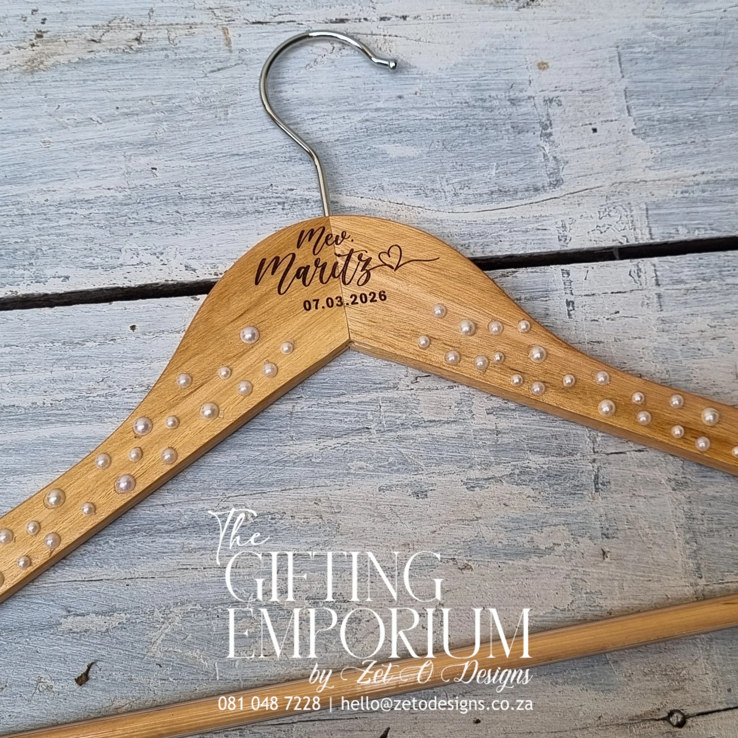 Personalised wooden wedding hanger with hearts and pearls by Zet O Designs